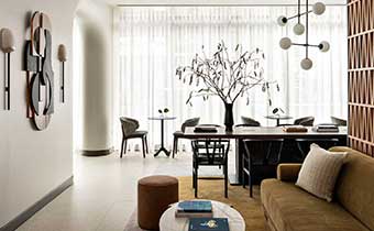 table and couch at Kimpton Theta